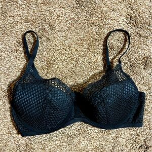 Black fishnet Victoria's Secret bra size 32d.